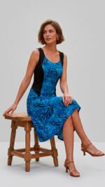 Vestido corto evasé modelo Michelle de confección propia con laterales a contraste estilizadores y estampado Hojas de Palma - KNS Boutique.